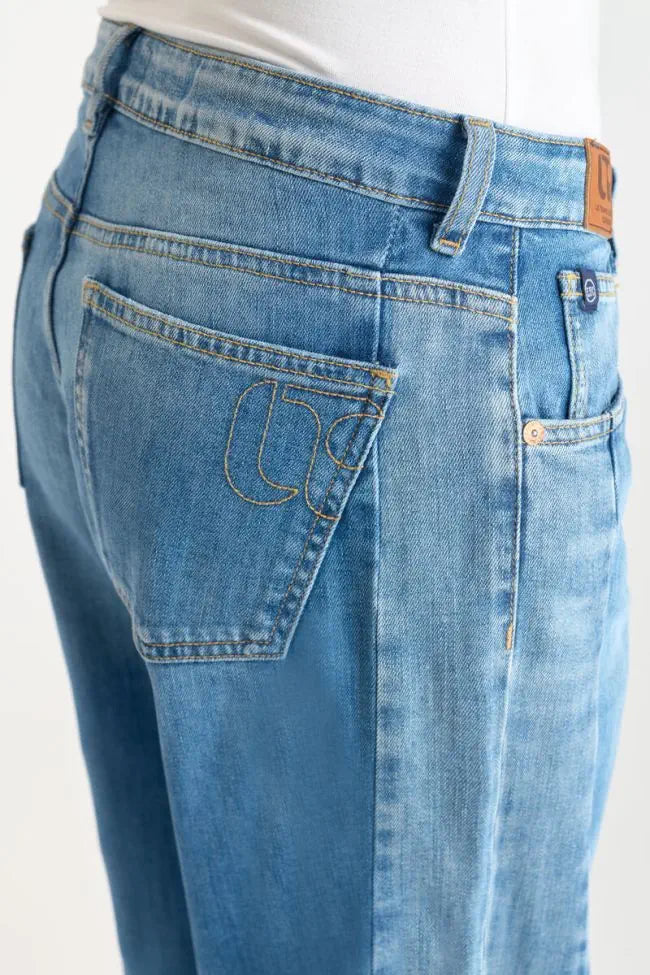 Close-up of the back pocket and signature Le Temps des Cerises branding.