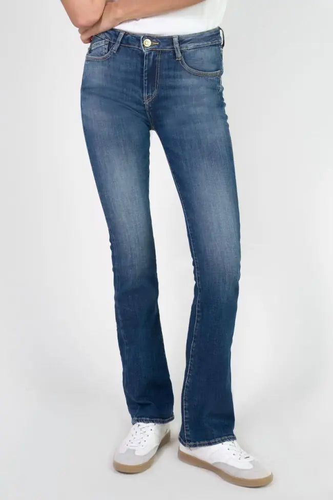Model wearing Le Temps des Cerises Power Denim Jeans in Blue with a flattering mid-rise bootcut silhouette.
