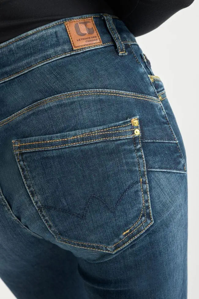 Close-up of the signature Le Temps des Cerises back pocket detailing.