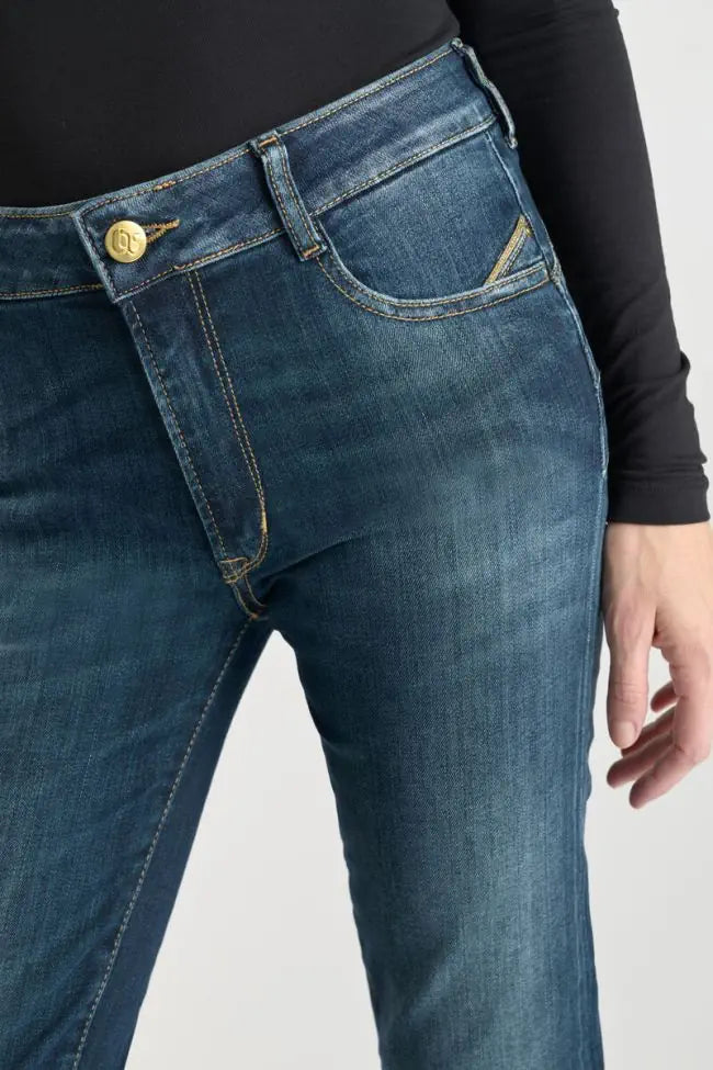 Close-up of the premium stretch denim and front pocket detailing.