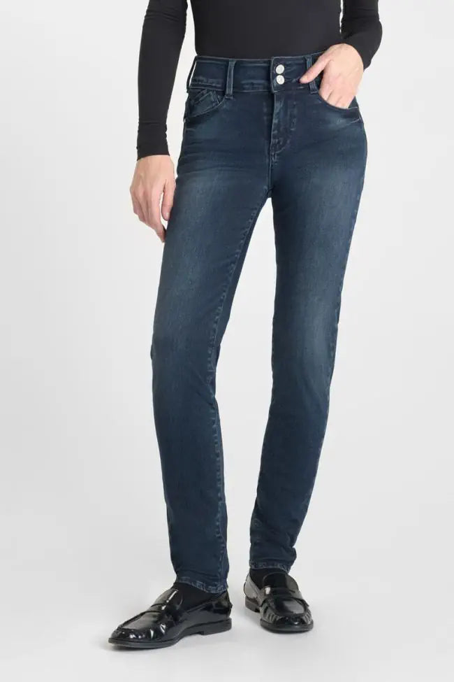 Model wearing Le Temps des Cerises Ultra Pulp Slim Evy jeans in Blue-Black No.1 with a slim-leg fit and double-button waistband.