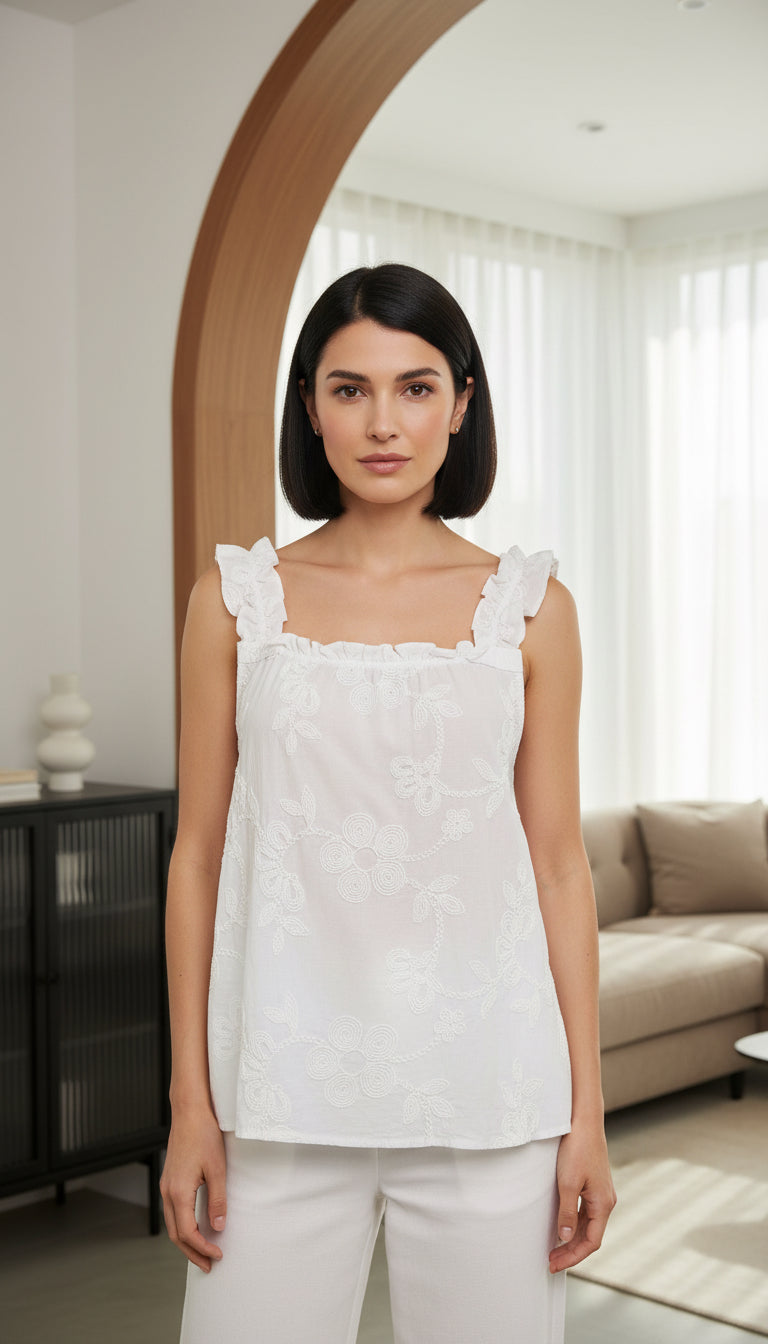 Model wearing Marta du Château Cassandra top in white front view