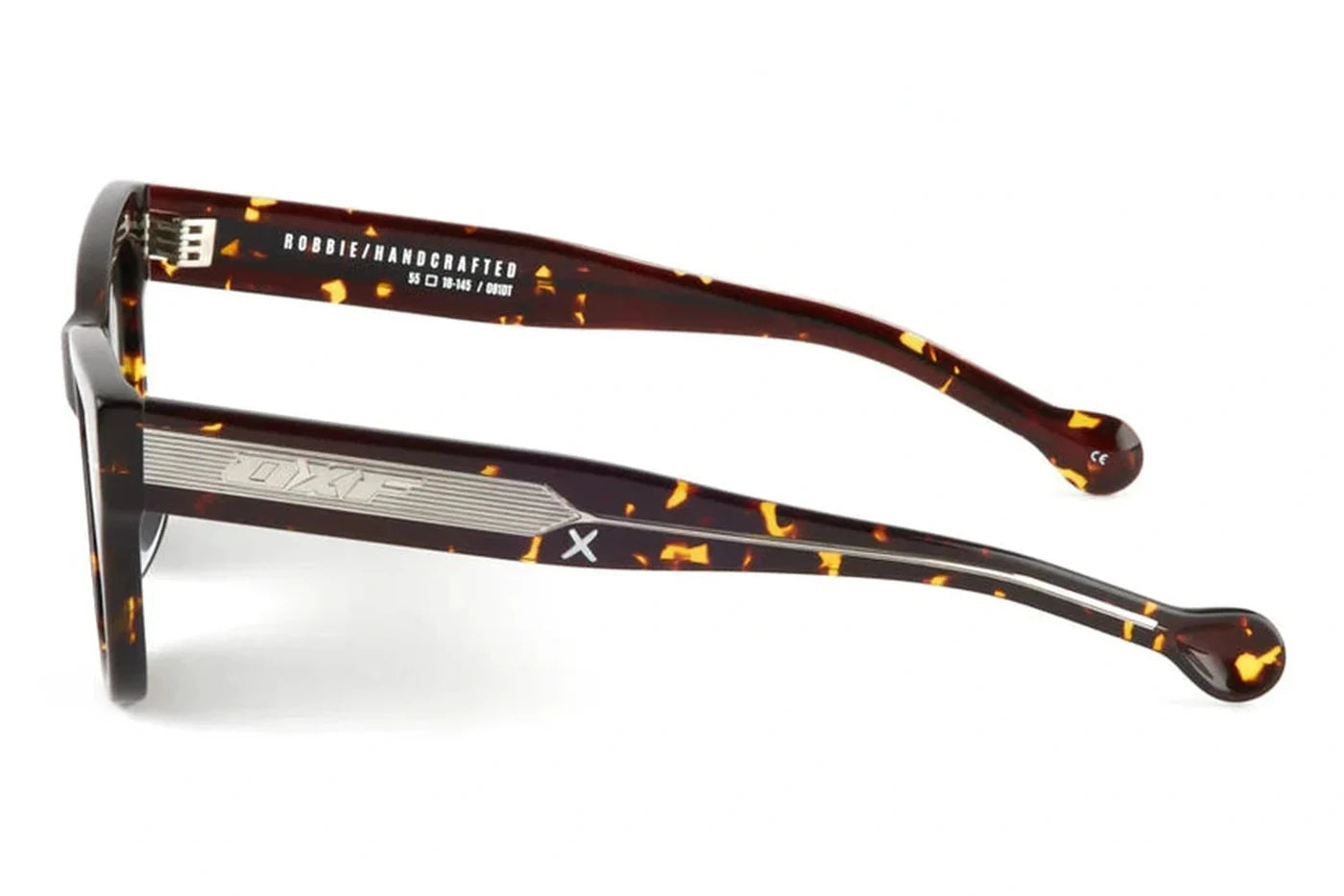 Side view of Oscar X Frank Robbie sunglasses in dark tort with premium acetate frame and signature metal temple detailing.