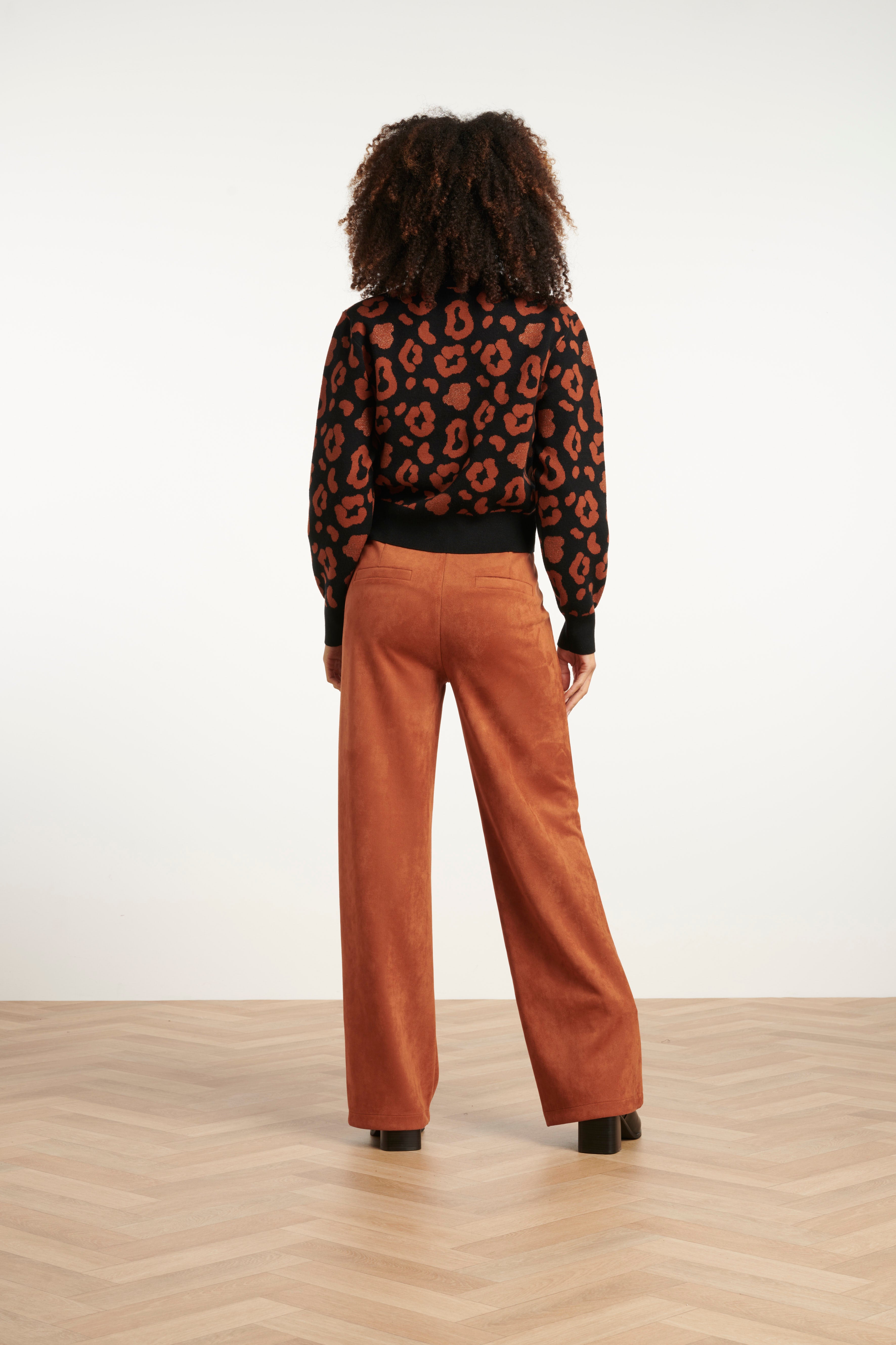 Smashed Lemon button-up knit cardigan in black with cognac leopard print, long sleeves, back view