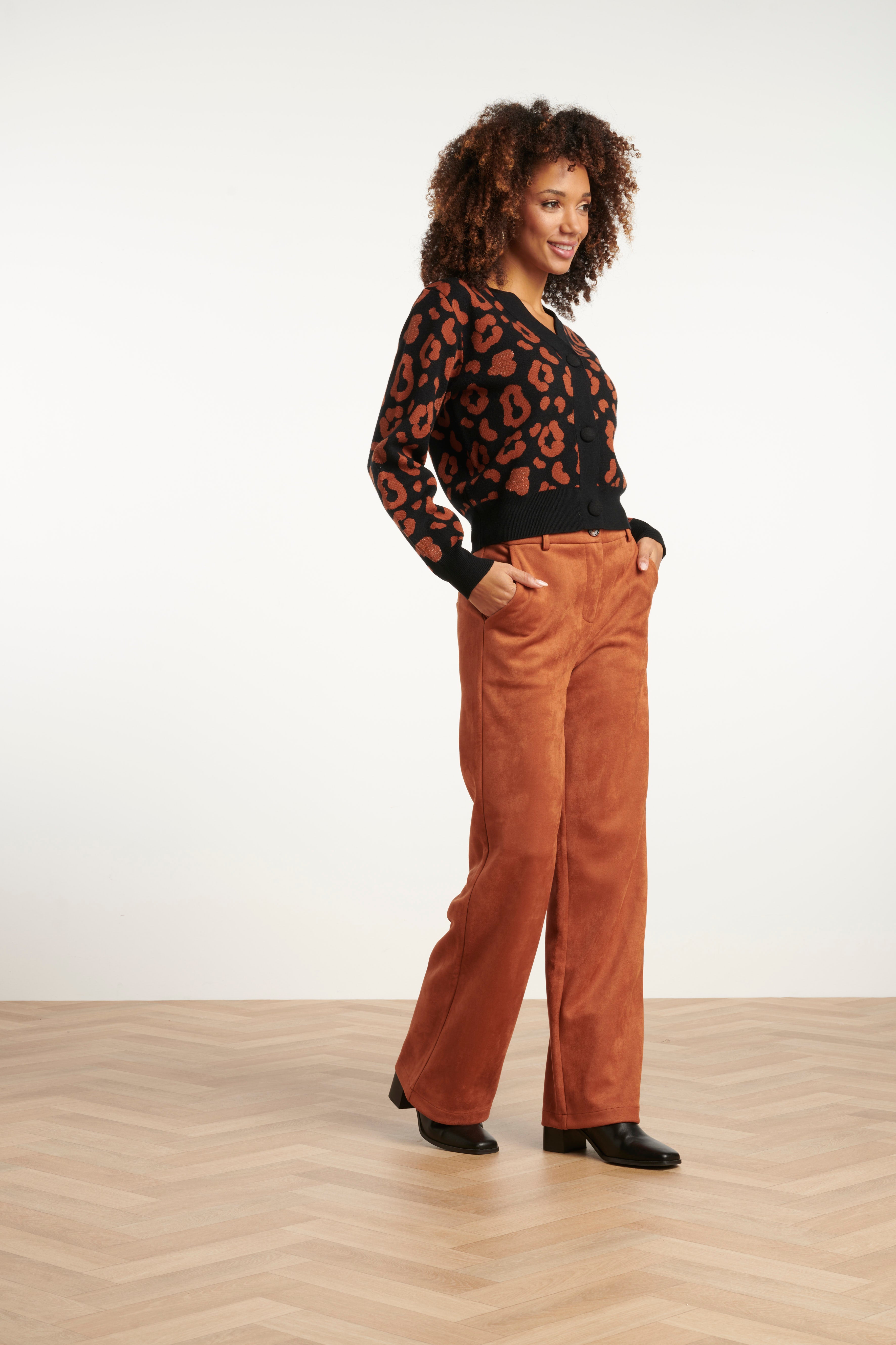 Smashed Lemon button-up knit cardigan in black with cognac leopard print, long sleeves, three-quarter angle view
