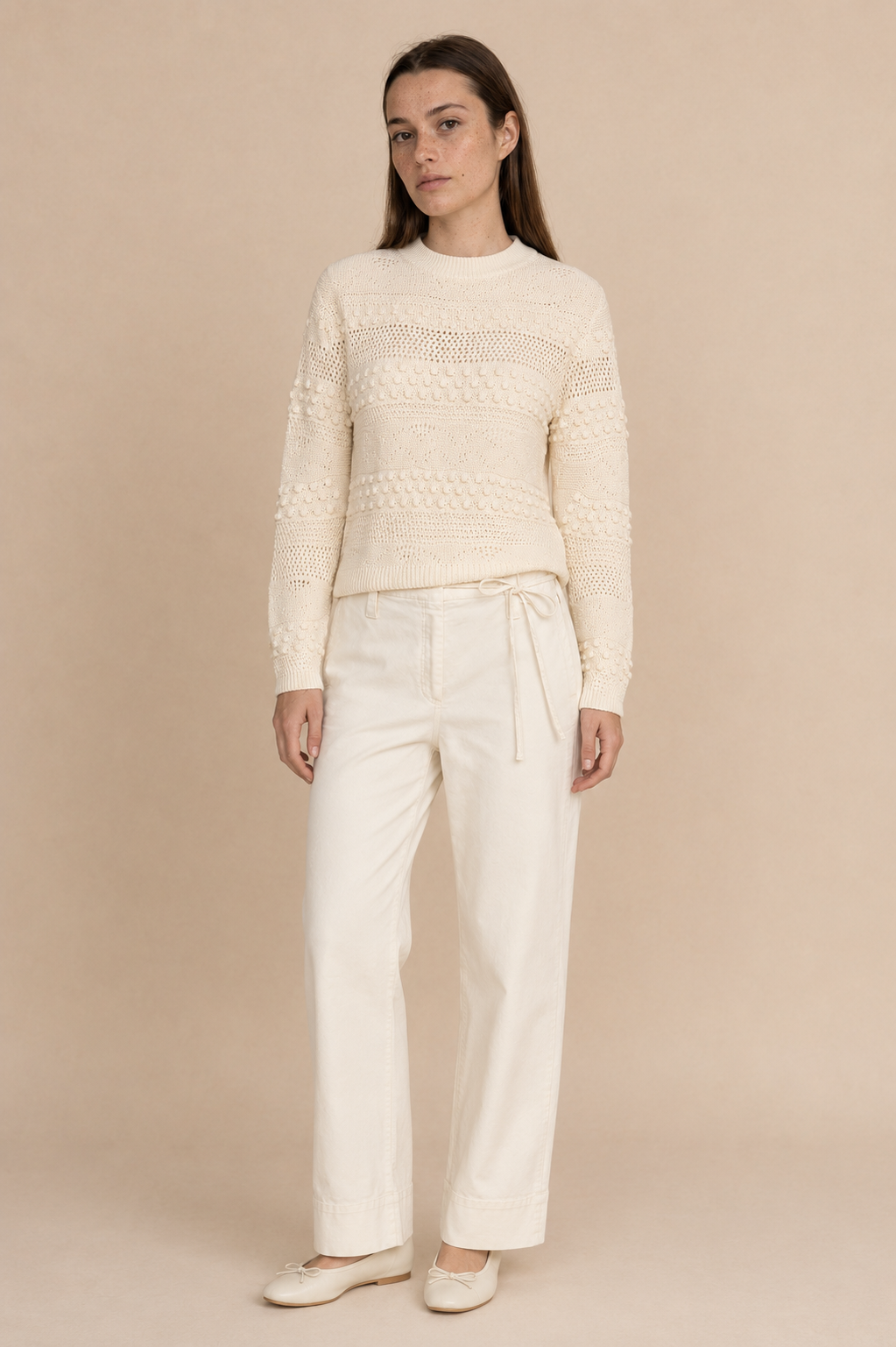 Smashed Lemon knit top in off white worn by a model, standing — Boetiek, Cape Town