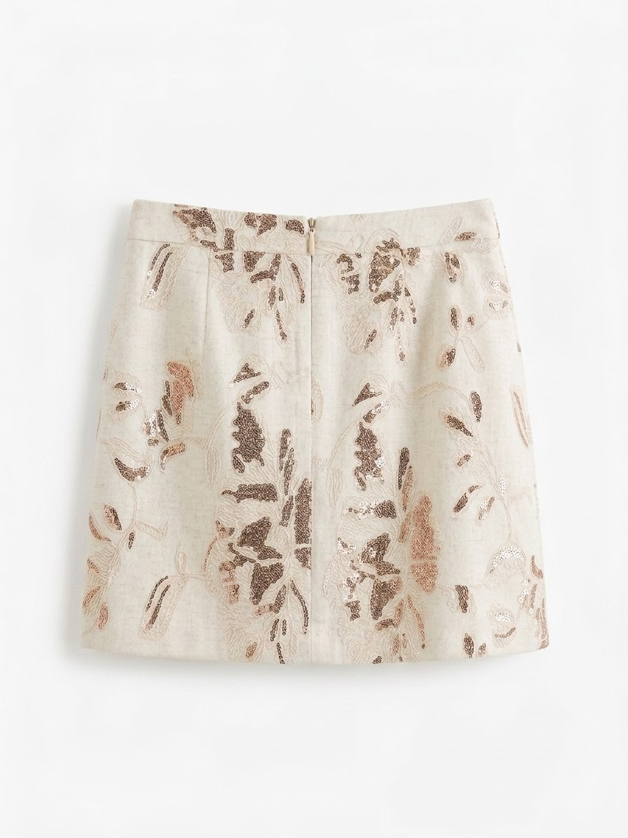 Smashed Lemon printed mini skirt in sand and copper back view with shimmering sequin floral detail