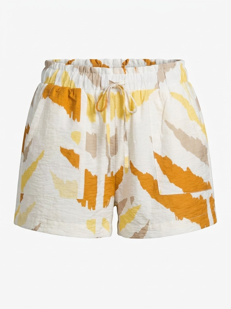 Smashed Lemon printed shorts in white and yellow front view with elasticated drawstring waist and patch pockets