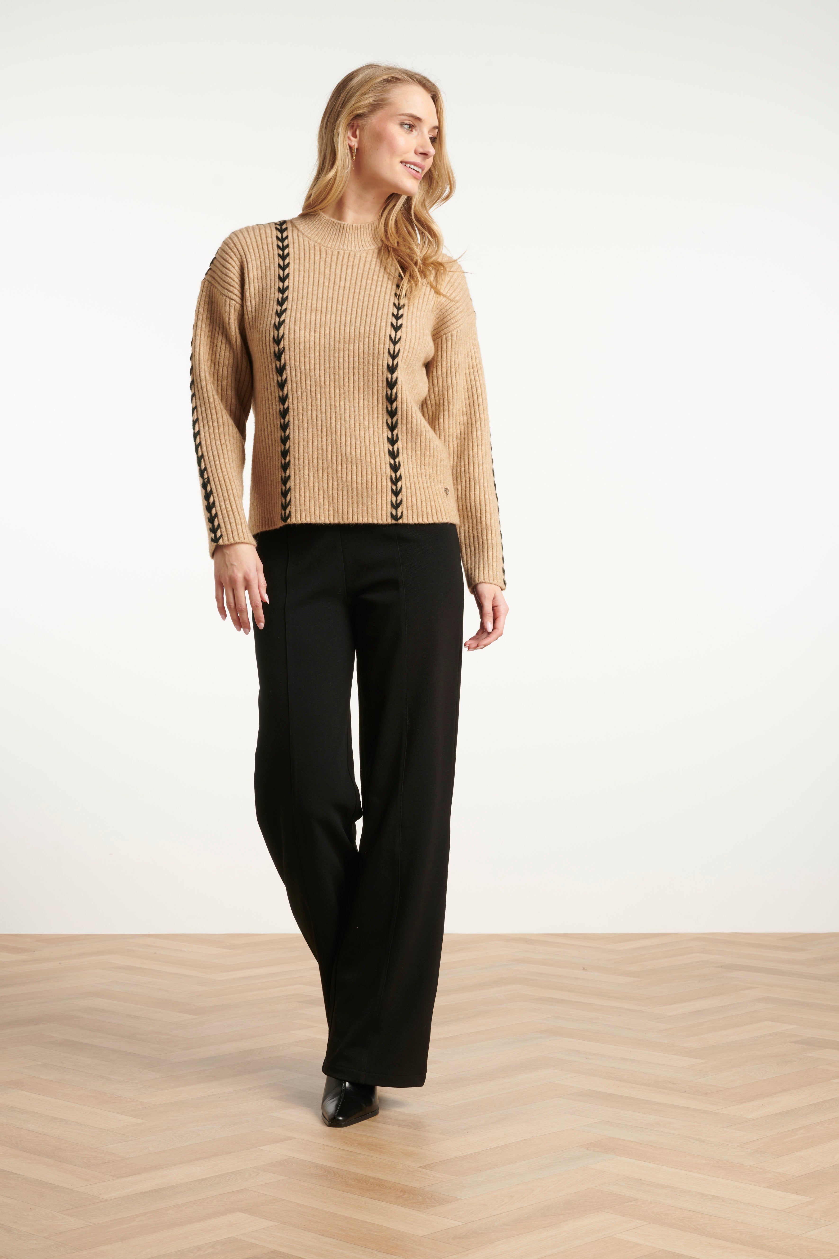 Smashed Lemon ribbed knit top in camel with black whipstitch contrast detailing, high neckline and long sleeves, front view