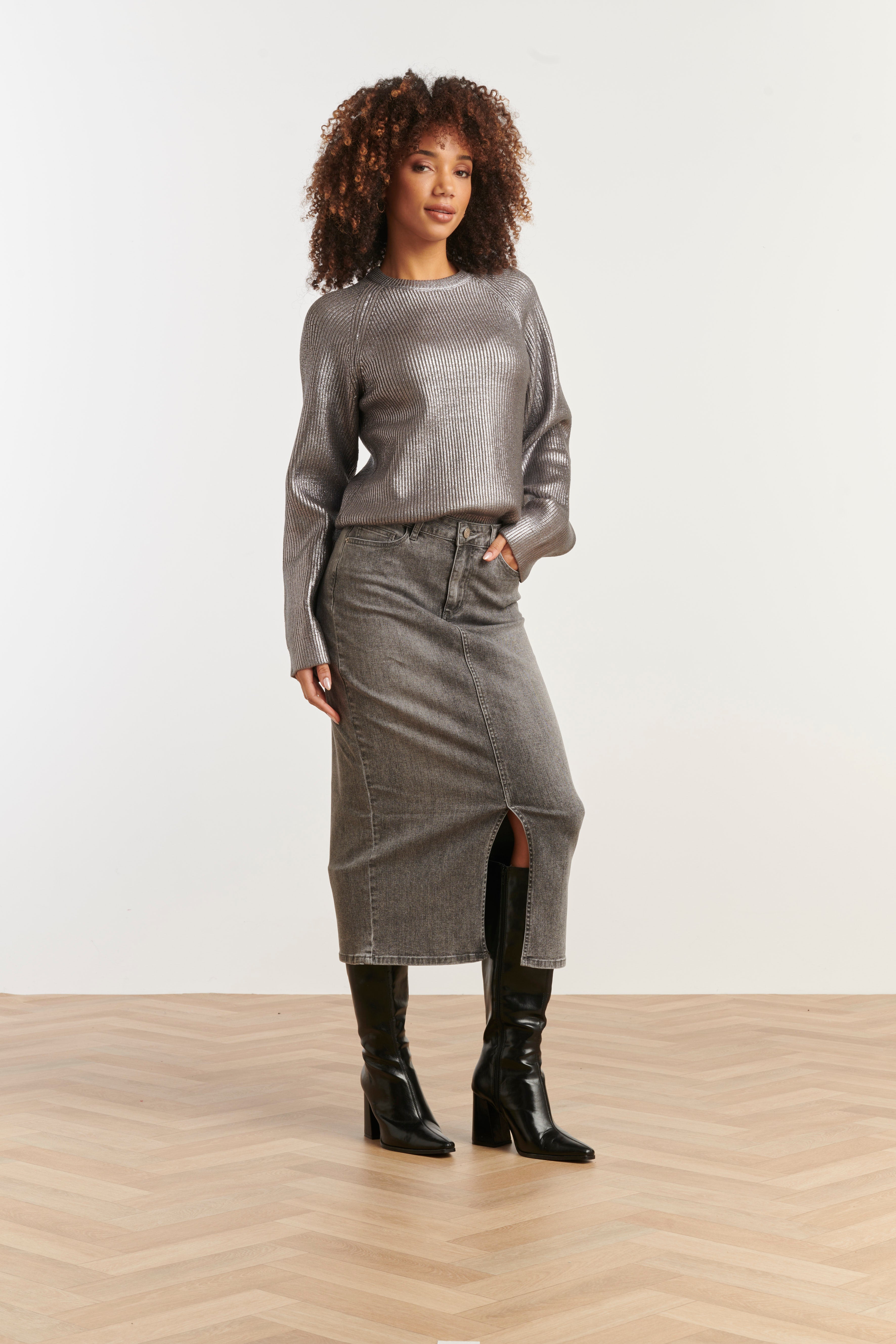 Smashed Lemon ribbed knit top in silver with metallic shimmer, long sleeves and relaxed fit, three-quarter angle view