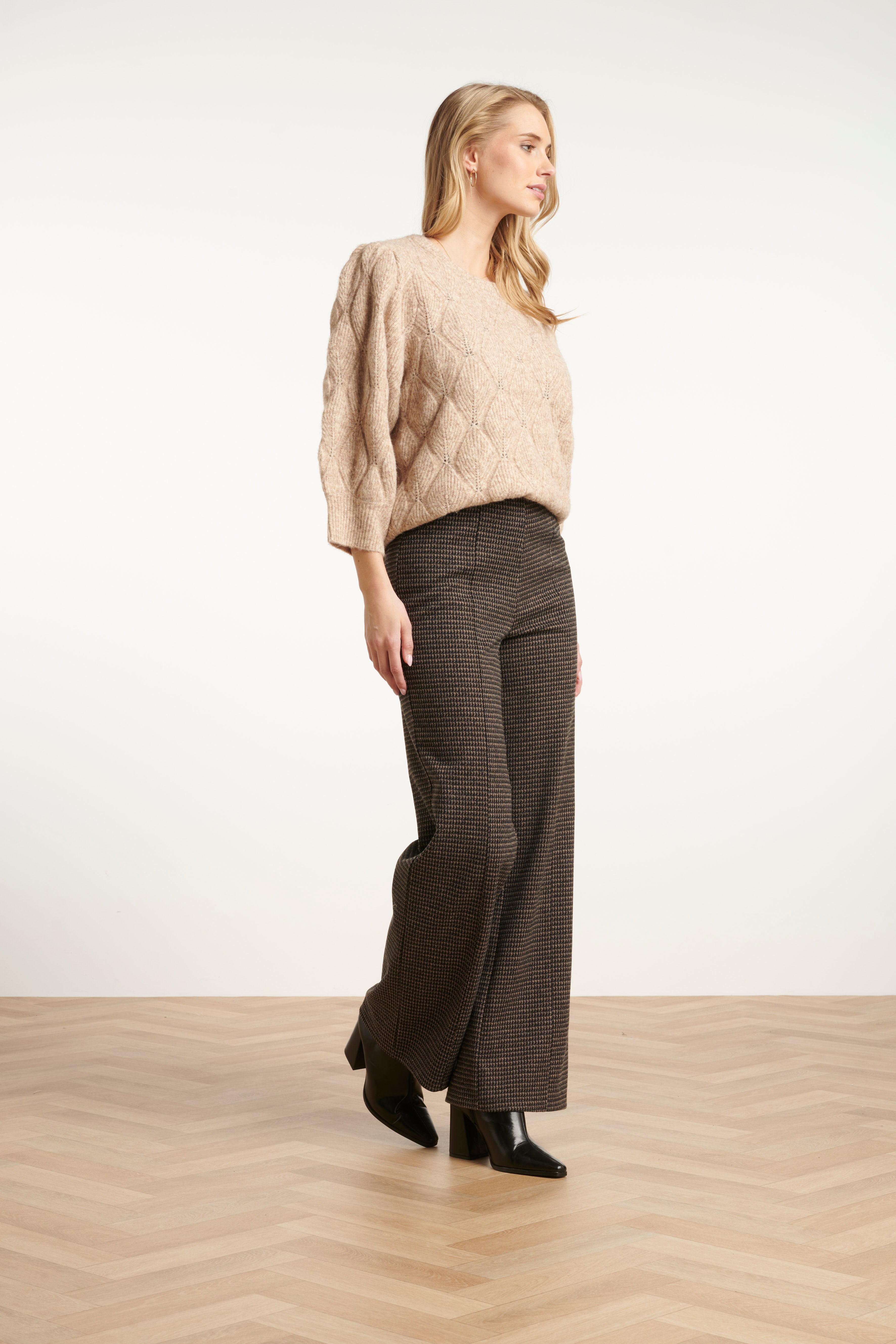 Smashed Lemon straight leg pant in black and sand check, high-waisted tailored fit, three-quarter angle view