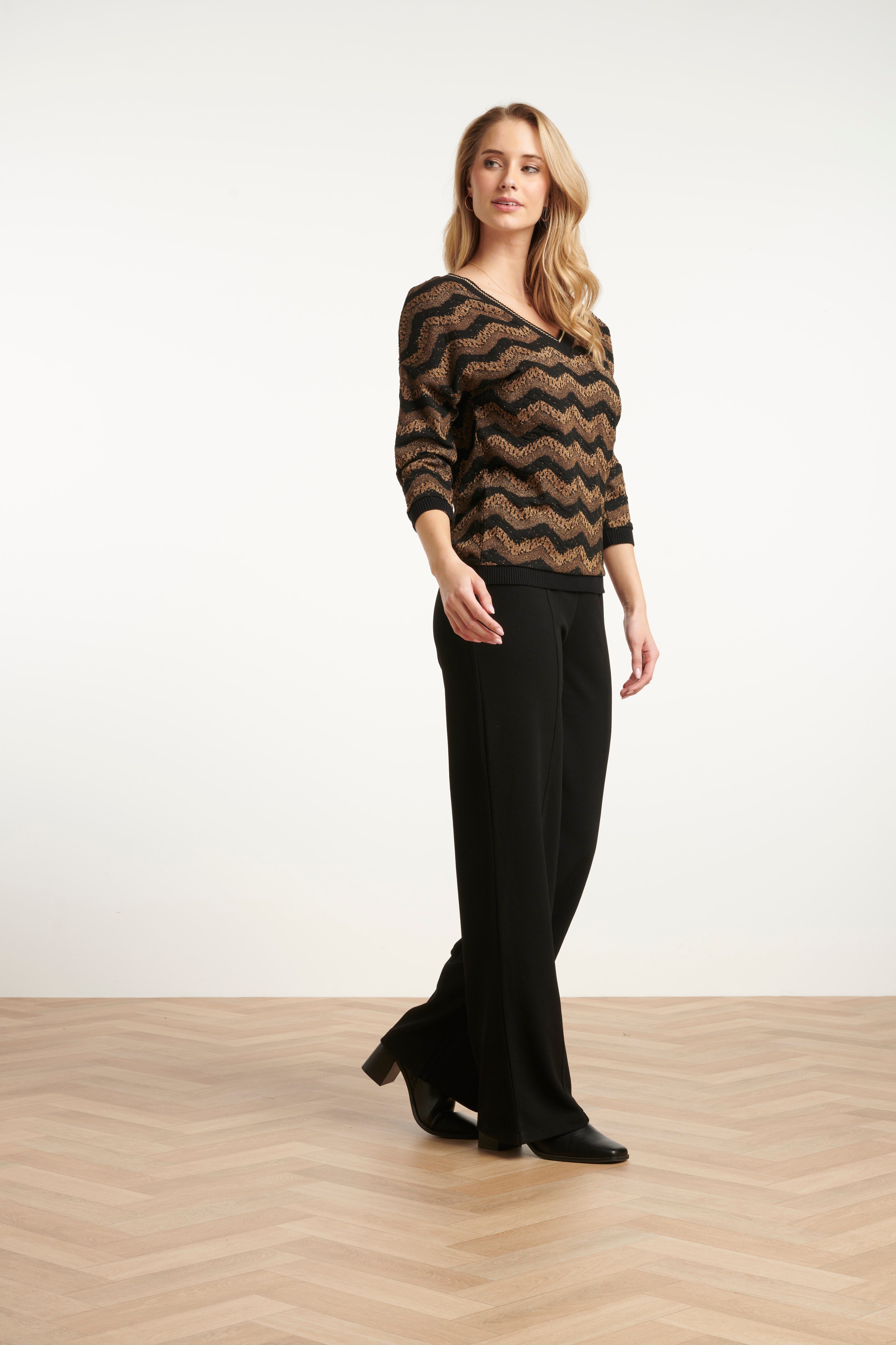 Smashed Lemon tailored pants in black with straight leg, three-quarter angle view