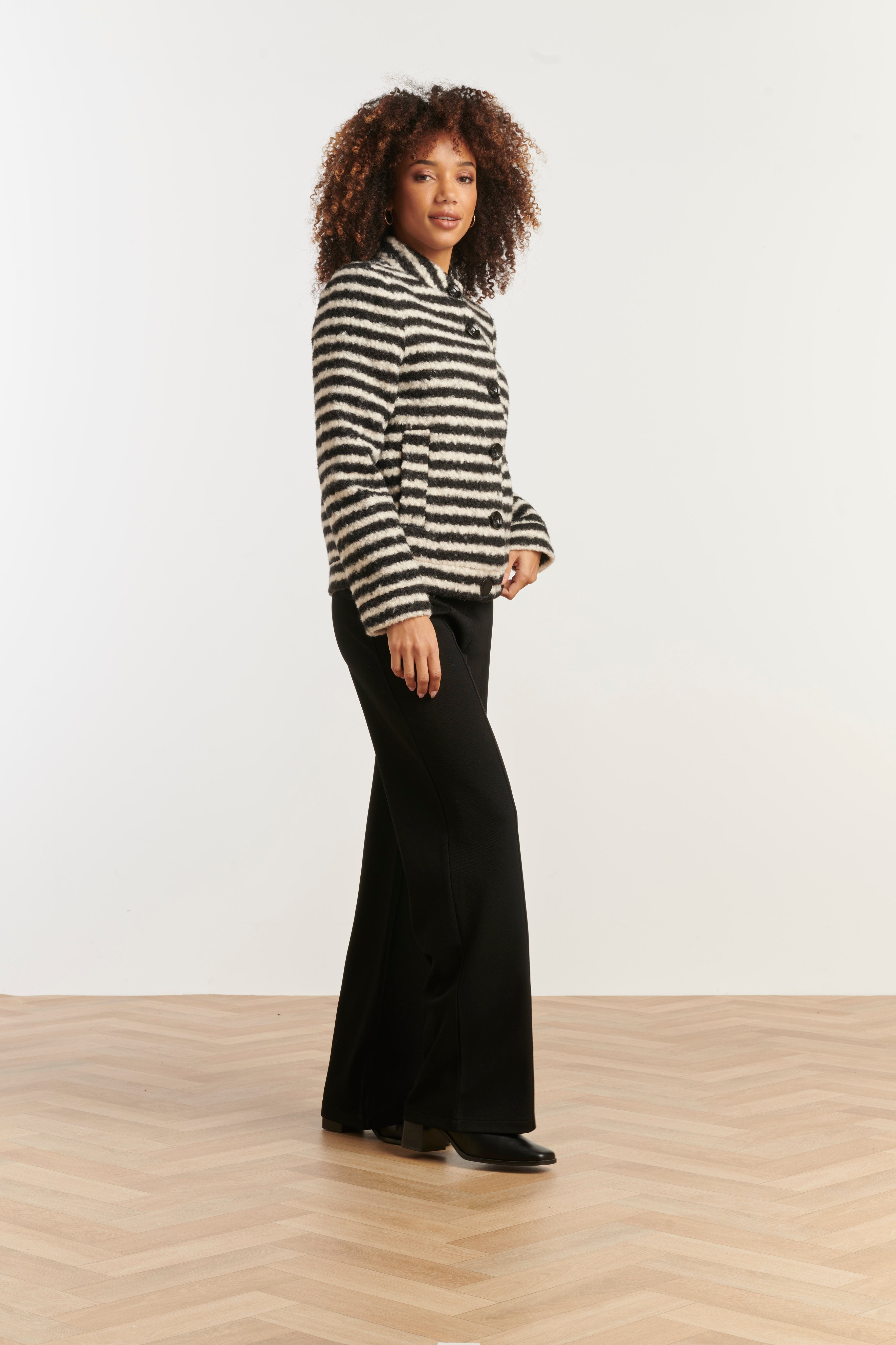 Smashed Lemon textured stripe coat in black and off-white, cropped boucle jacket with spread collar, three-quarter angle view