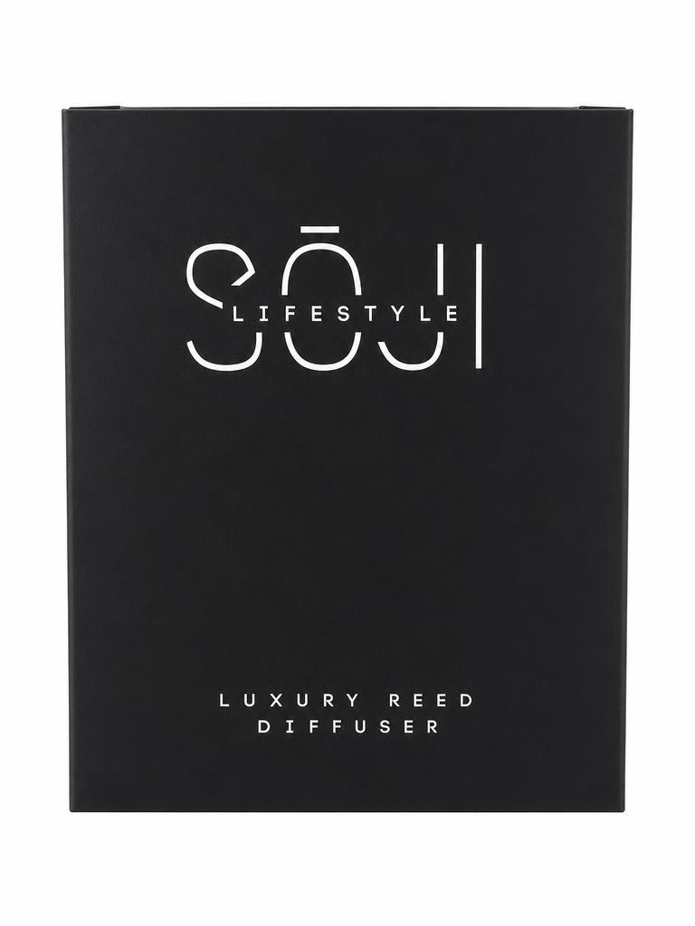 SŌJI Diffuser Boost reed diffuser set featuring fragrance oil, black reeds and a sculptural taupe diffuser vessel presented in a luxury gift box.