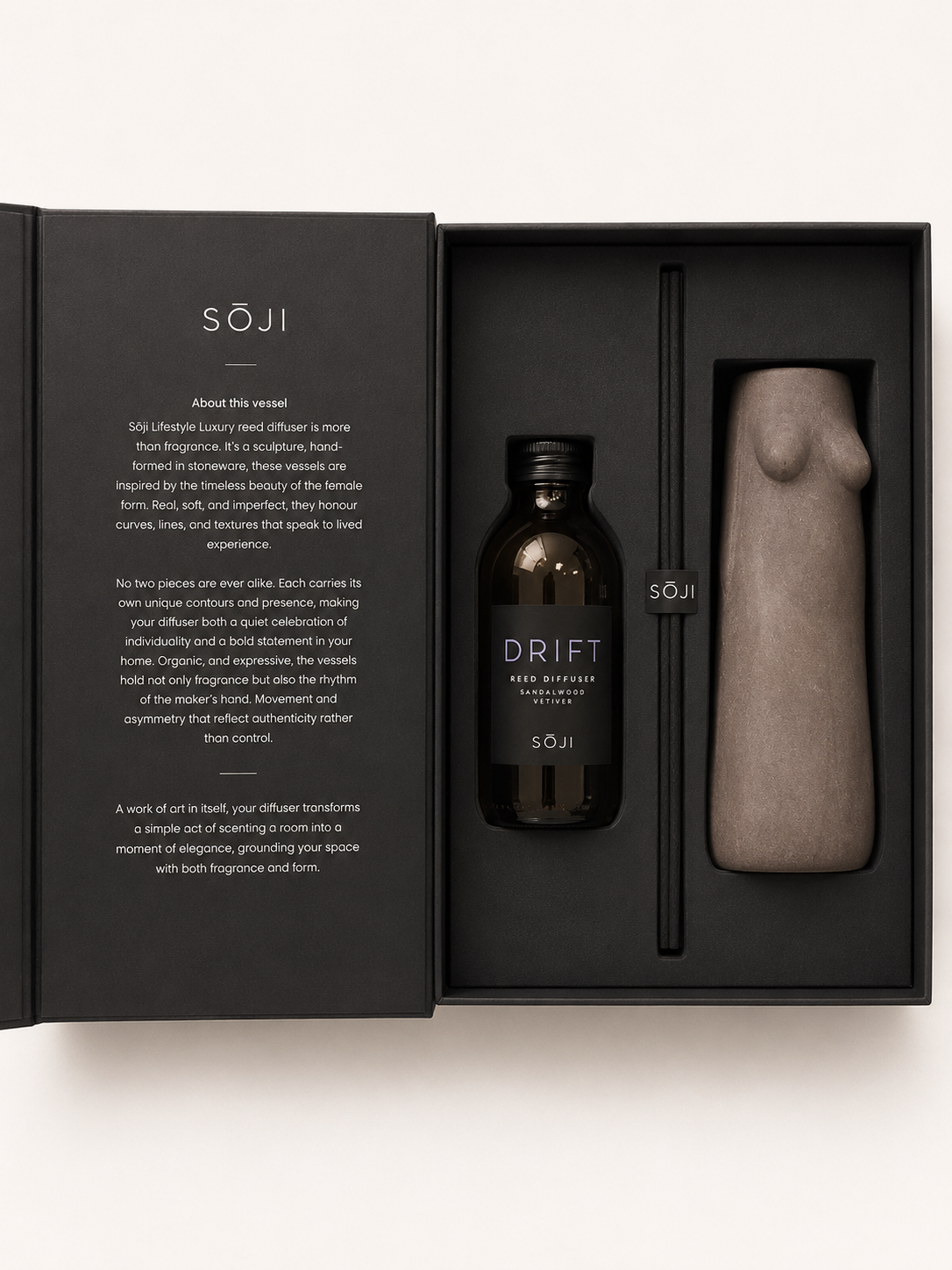 SŌJI Drift reed diffuser featuring sandalwood and vetiver fragrance oil, black reeds and a handcrafted sculptural stoneware vessel presented in a luxury gift box.