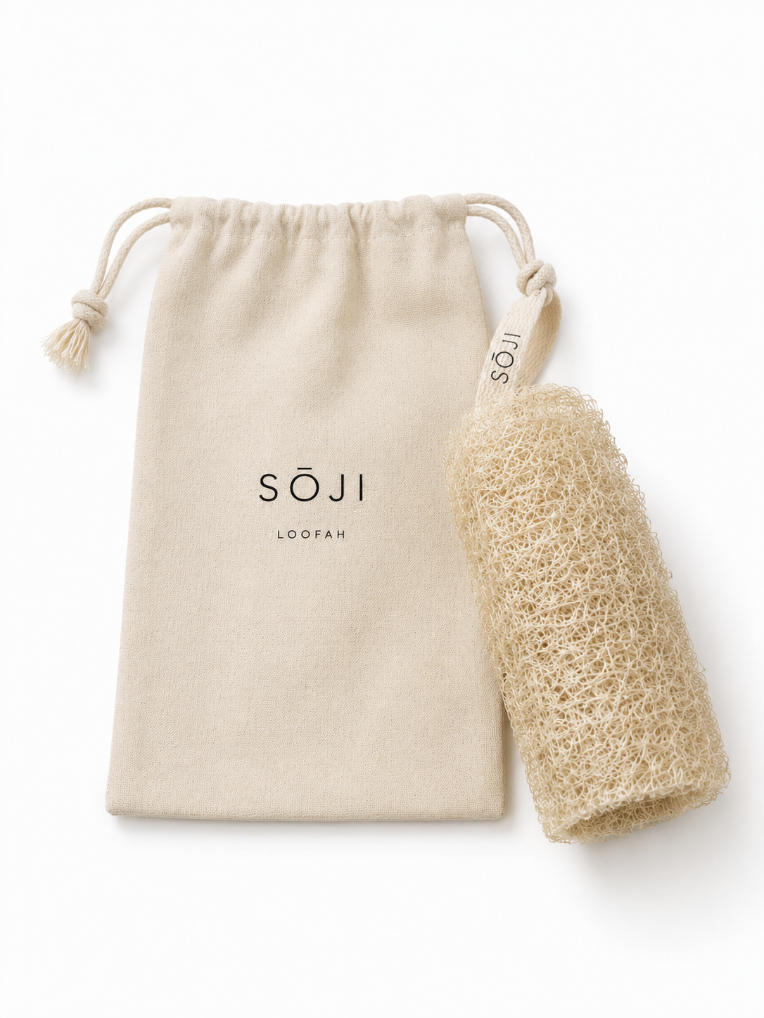 SŌJI natural loofah body exfoliator presented alongside a branded reusable drawstring pouch in a natural cream colour.