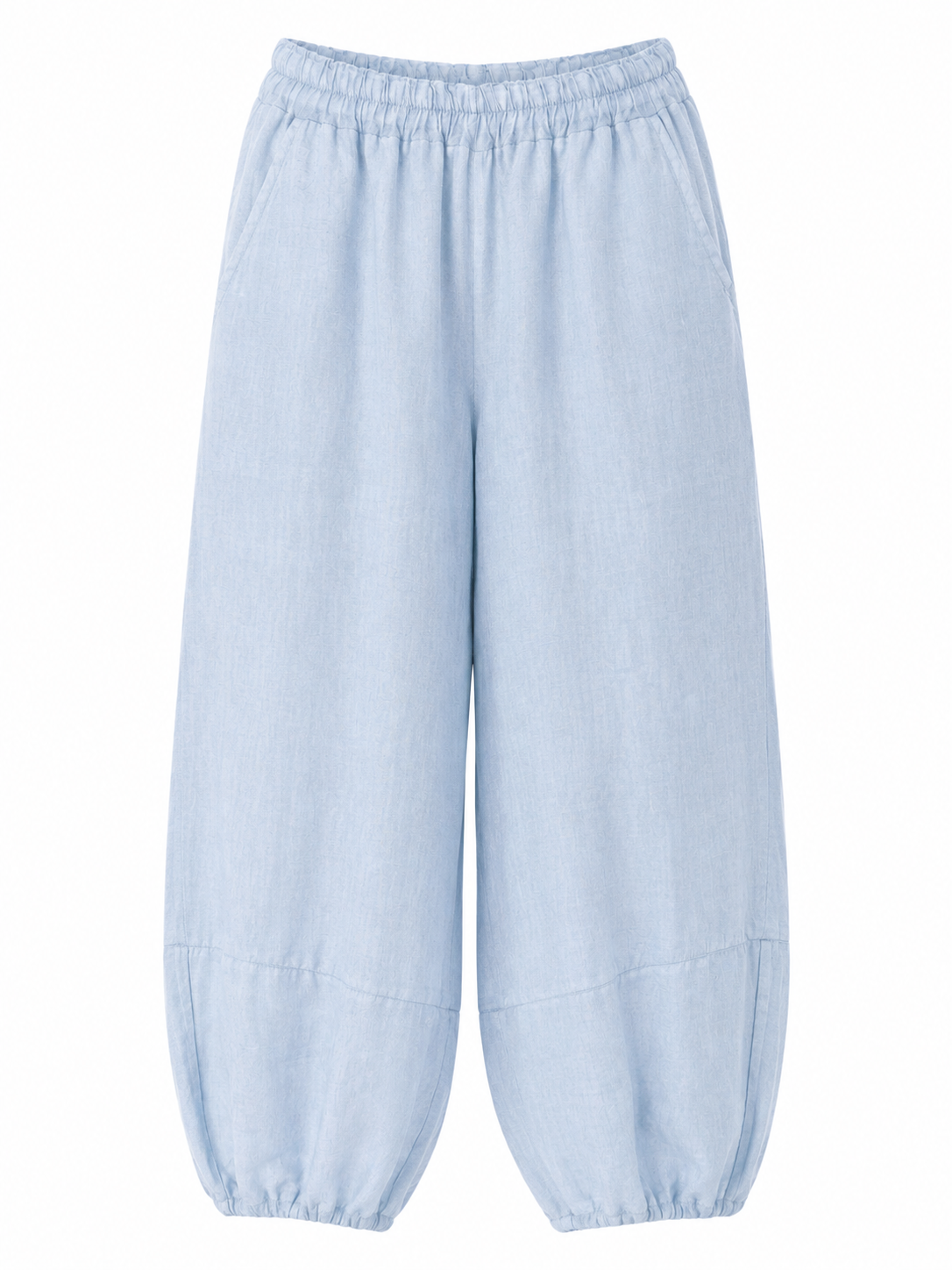 Suzy D barrel leg trousers in light blue with an elasticated waist, side pockets and gathered cuffs, front view.