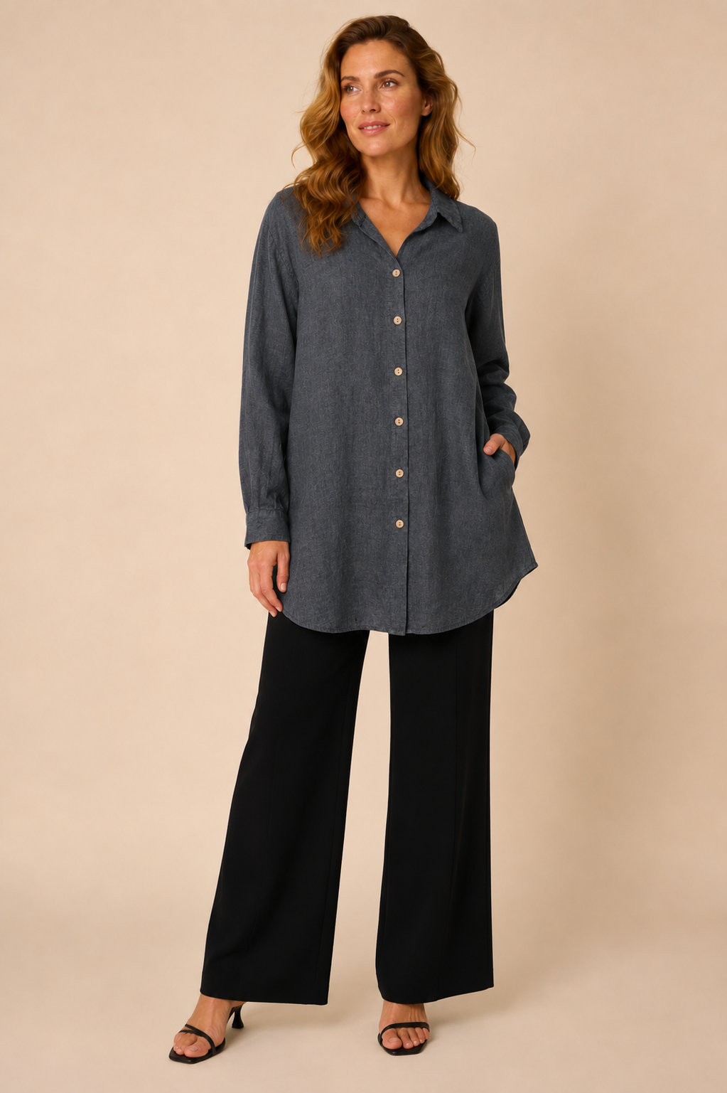 Suzy D Soraya linen long shirt in anthracite worn by a model, standing — Boetiek, Cape Town