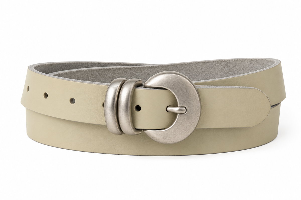 YAYA Leather Belt in Sandstone Beige featuring a brushed silver-tone moon buckle, double metal keepers and adjustable fastening holes on a white background