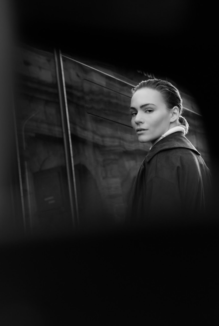 Close portrait of model wearing YAYA olive brown coat