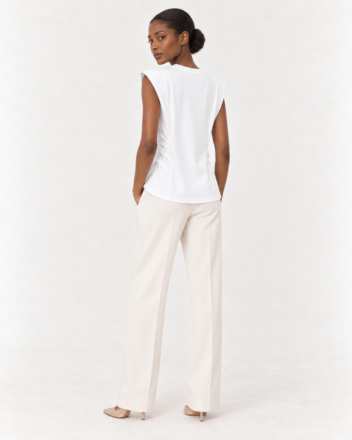 Model wearing the YAYA pleated side top in Pure White, back view #Colour_Pure White