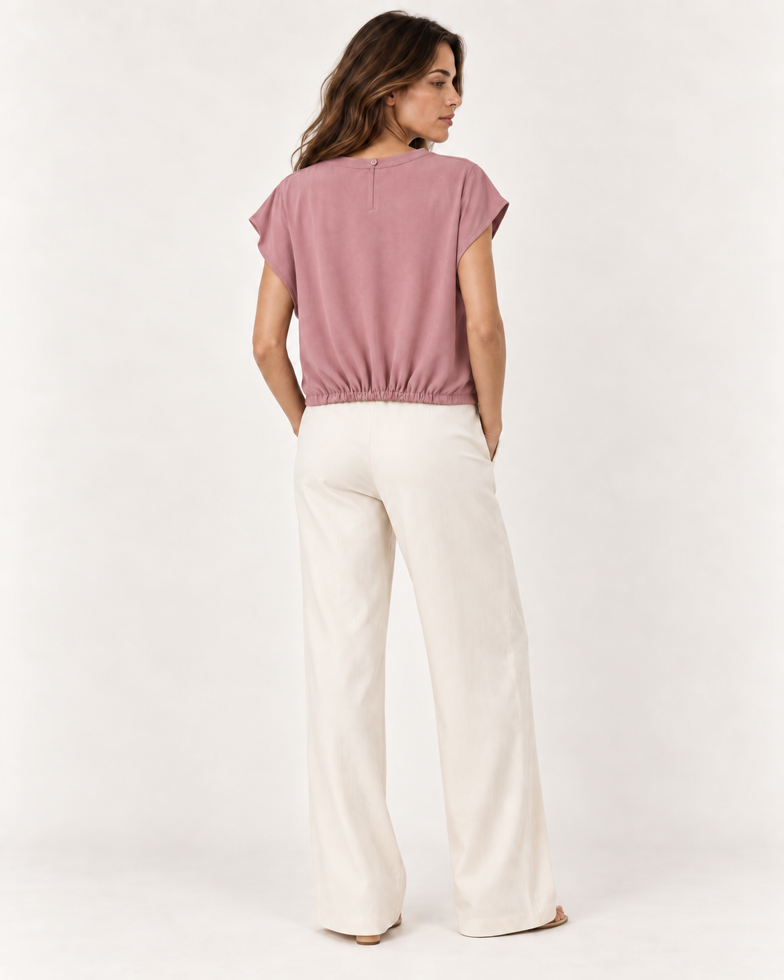 Model wearing the YAYA Knot Hem Top in Burlwood Pink, back view with the button fastening at the centre back neck #Colour_Burlwood Pink